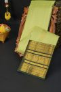 Kancheepuram Silk Light Green Saree With Florals And Peacocks Border
