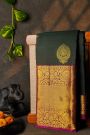 Kancheepuram Silk Bottle Green Saree With Florals And Leaves Border