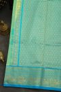 Venkatagiri Silk Mint Green Saree With Florals And Peacocks Border