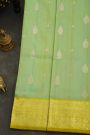 Venkatagiri Silk Pista Green Saree With Florals And Buttis Body