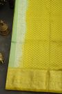 Venkatagiri Silk Pista Green Saree With Florals And Buttis Body
