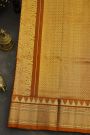 Venkatagiri Silk Rust Orange Saree With Zari Checks And Peacock Buttis Body