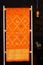 Venkatagiri Silk Orange Saree With All Over Floral Buttis And Animal Weave Body