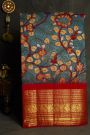 Kalamkari Silk Sky Blue Saree With Peacocks In Zari Lines Border