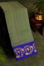 Gadwal Silk Mehendi Green Saree With Tanjore Hand-Painted Florals And Gandaberunda Border