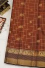 Kancheepuram Silk Rust Saree With Checks And Traditional Border