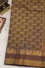 Kancheepuram Silk Rust Saree With Checks And Traditional Border