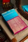 Kancheepuram Silk Sky Blue Saree Zari Lines And Florals Body Contrast Border
