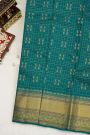 Kancheepuram Silk Teal Blue Saree With Zari Checks Body Self Border