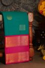 Kancheepuram Silk Rama Green Saree With Florals and Peacocks Border