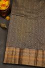 Kancheepuram Silk Rust Black Saree With Florals And Peacocks Border