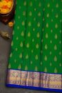 Kancheepuram Silk Bottle Green Saree With Florals And Leaves Jaal Border