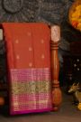 Kancheepuram Silk Rust Orange Saree With Florals And Leaves Jaal With Peacocks Border