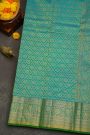 Kancheepuram Silk Parrot Green Saree With Florals And Leaves Jaal Border