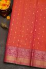 Kancheepuram Silk Peach Saree With Florals And Leaves With Cross Lines Border