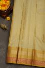 Kancheepuram Silk Cream Saree With Florals And Leaves With Diamonds Border