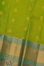 Kancheepuram Silk Green Saree With Florals And Peacocks In Cross Lines Border