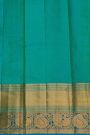 Kancheepuram Silk Green Saree With Florals And Peacocks In Cross Lines Border