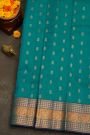 Kancheepuram Silk Teal Blue Saree With Florals And Leaves With Temples Border