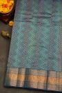 Kancheepuram Silk Teal Blue Saree With Florals And Leaves With Temples Border
