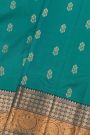 Kancheepuram Silk Teal Blue Saree With Florals And Leaves With Temples Border