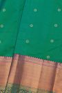 Kancheepuram Silk Peacock Green Saree With Florals And leaves In Cross Lines Border