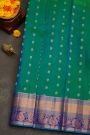 Kancheepuram Silk Peacock Green Saree With Floral Brocade Pallu