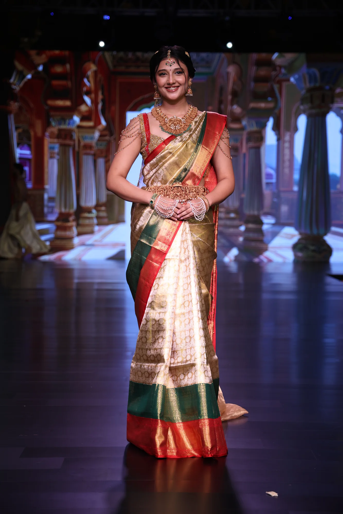 The all-over zari Kanchipuram bridal saree with its red and green double border